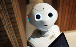 robot synonymous with AI looks directly into the camera